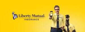 An image of a man holding his phone with Liberty Mutual Commercial app